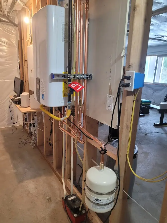 Licensed plumber repairing a kitchen sink in Mountain Brook